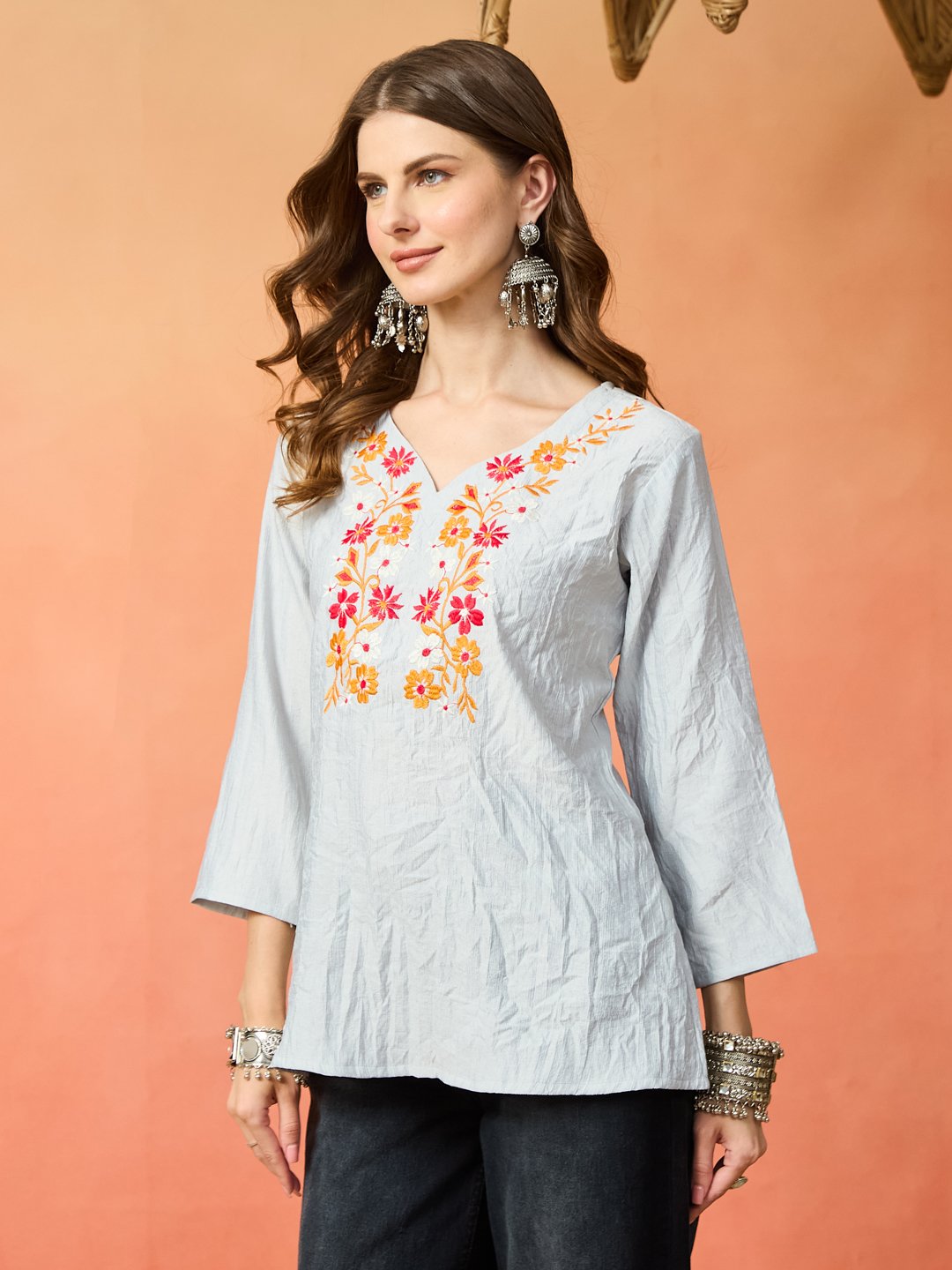 Women's Light Blue Embroidered Cotton-Style Kurti with Floral Front Design
